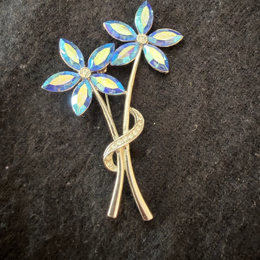 Dazzling Floral Brooch with Blue and Silver Accents